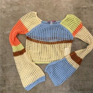 Urban Outfitters multicolor open‑knit sweater.